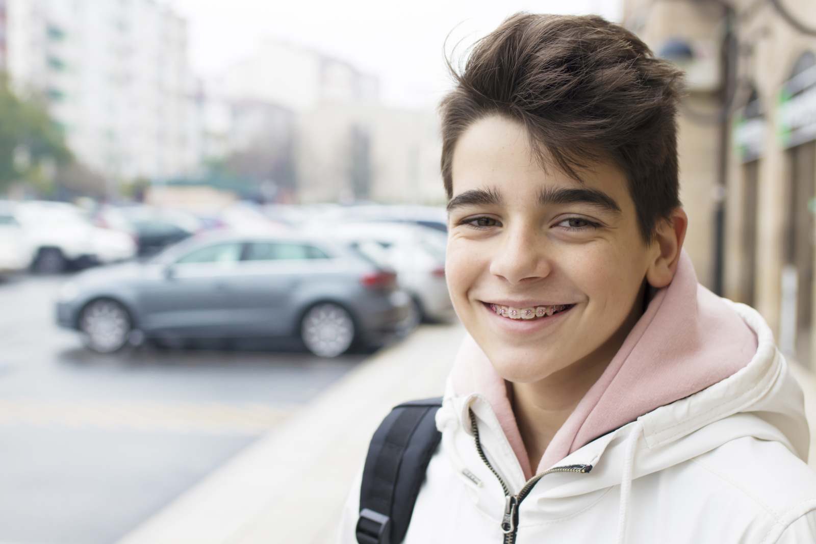 Teenage boy smiling with braces